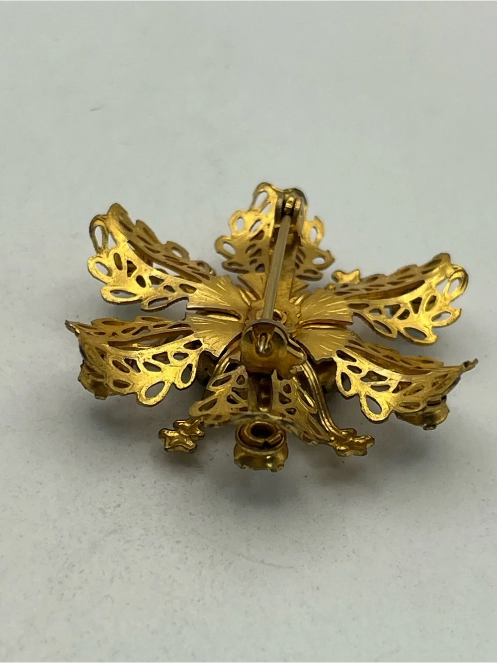 Miraculous medal Catholic Virgin Mary blue rhinestone gold tone starburst brooch